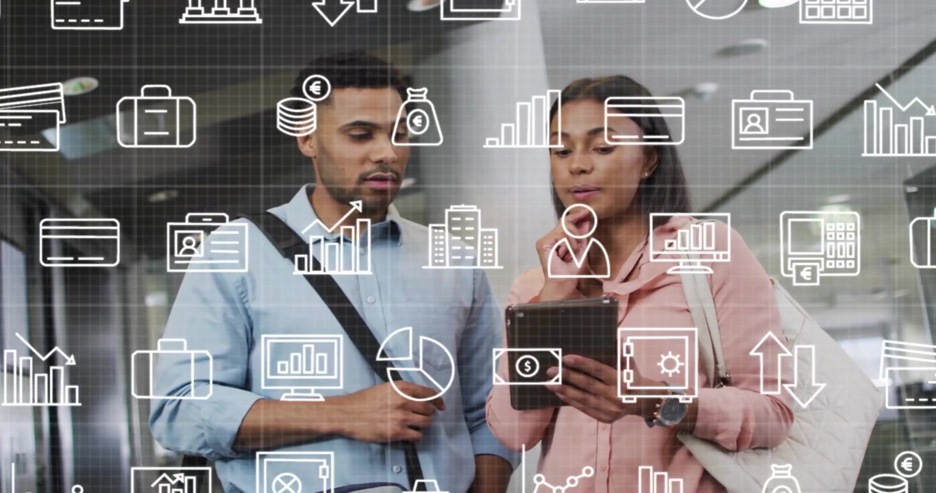 Coworkers scrolling tablet and pointing chart while floating icons revealing finance data