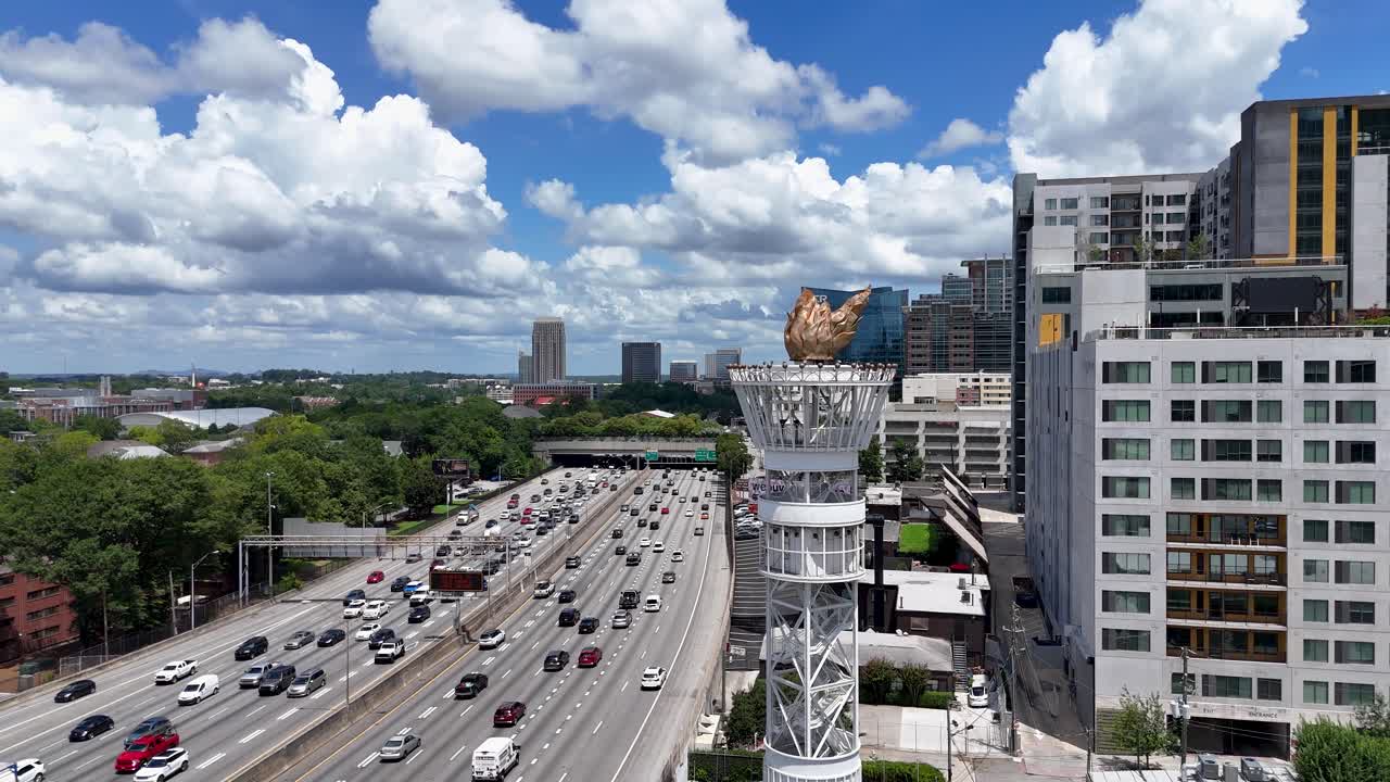 Aerial shot pushing in on The 1996 Olympic Torch.