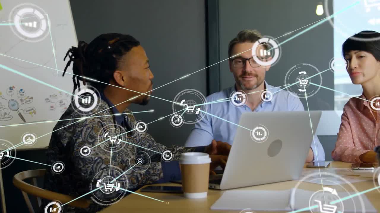 Animation of network of digital icons over diverse colleagues discussing together at office