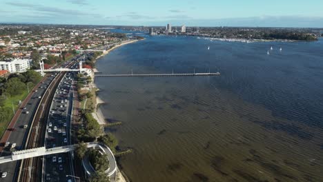 traffic car along freeway near como jetty along swan river at perth city, western australia