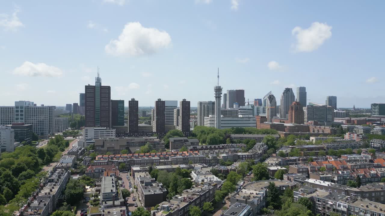 High-rise buildings and modern cityscape of The Hague, captured from above on a clear summer day