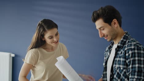 Video-of-couple--in-their-new-empty-house.