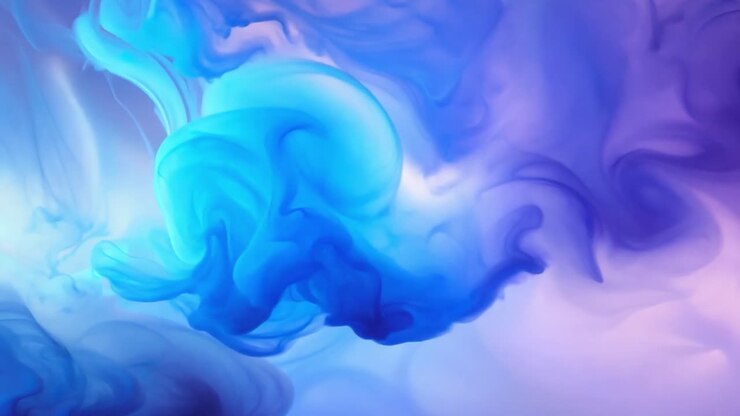 Abstract Swirls of Blue and Purple Ink in Water