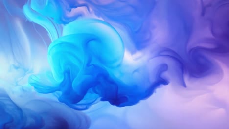 abstract swirls of blue and purple ink in water