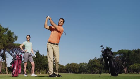 golfers playing golf