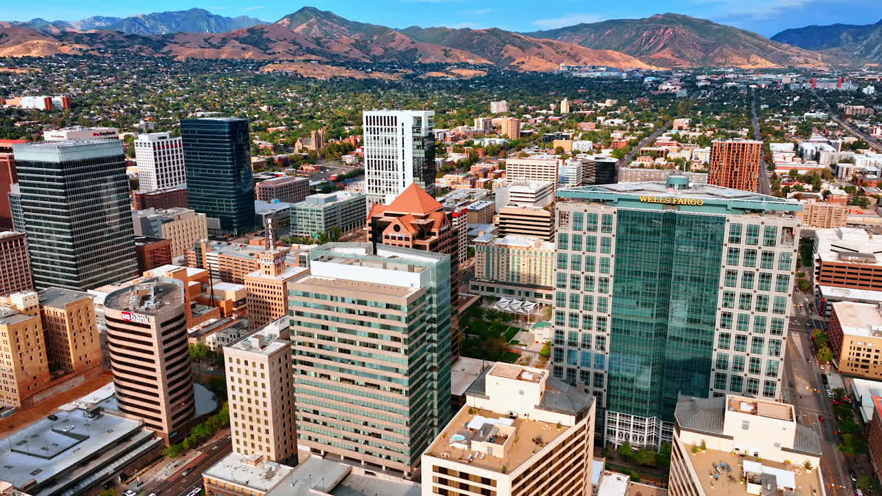 Salt Lake City USA, 1 August 2025: Skyline of Salt Lake City with Wells Fargo and US Bank towers. High angle view of Salt Lake City skyline featuring Wells Fargo and US Bank towers against mountains