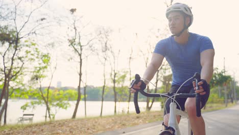 man cycling in park