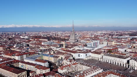 aerial wide shot of turin city centre showing landmark mole antonelliana