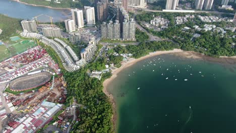 Aerial-view-of-Hong-Kong-Wu-Kai-Sha-area-with-modern-residential-building-complex-and-Tolo-Harbour-open-bay