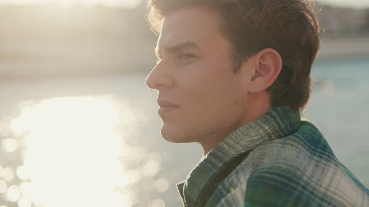 Peaceful Man at Sunset Over Seville River
