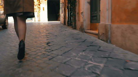 woman in a hurry running along the street