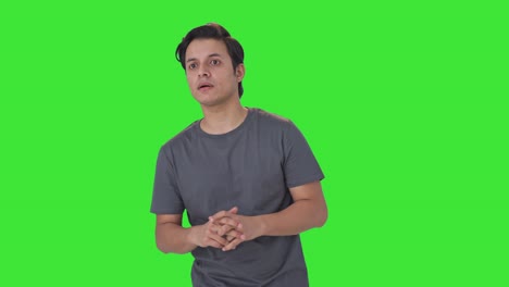 Indian-man-trying-to-find-someone-Green-screen