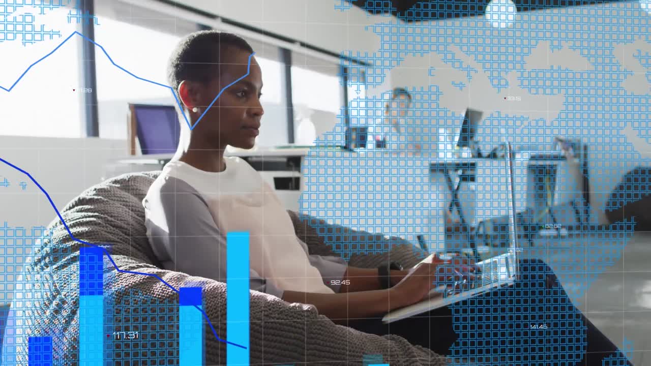Animation of diverse graphs over afrcian american woman with laptop in office