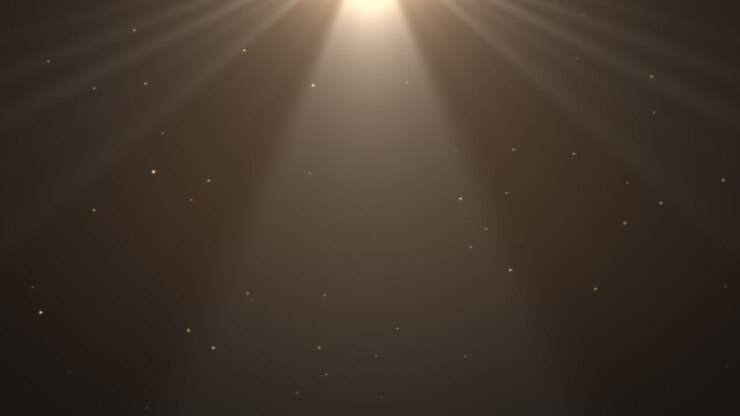 solstråler og faldende guld glitter og konfetti på mode baggrund