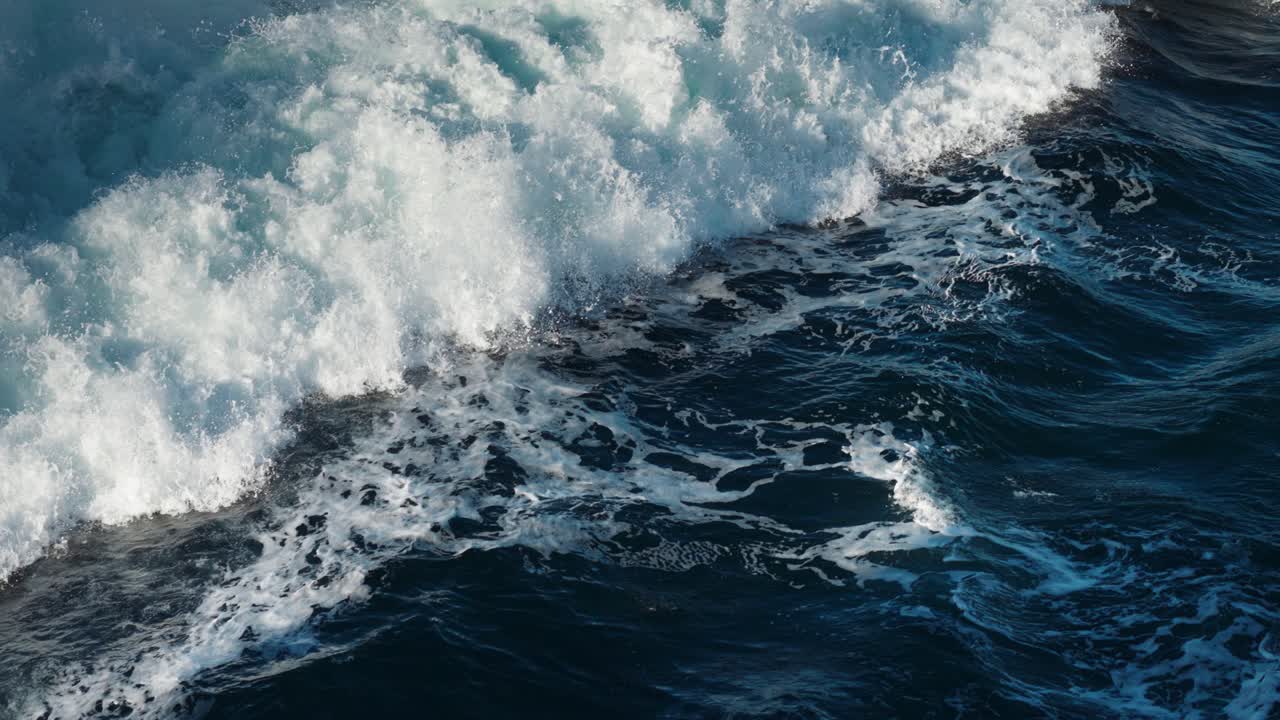 Premium stock video - Raging, splashing water trails left by the ...