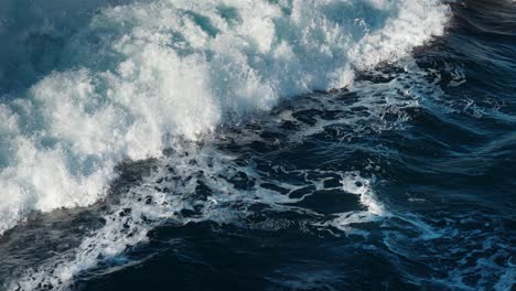 Raging,-splashing-water-trails-left-by-the-passing-catamaran-ferry