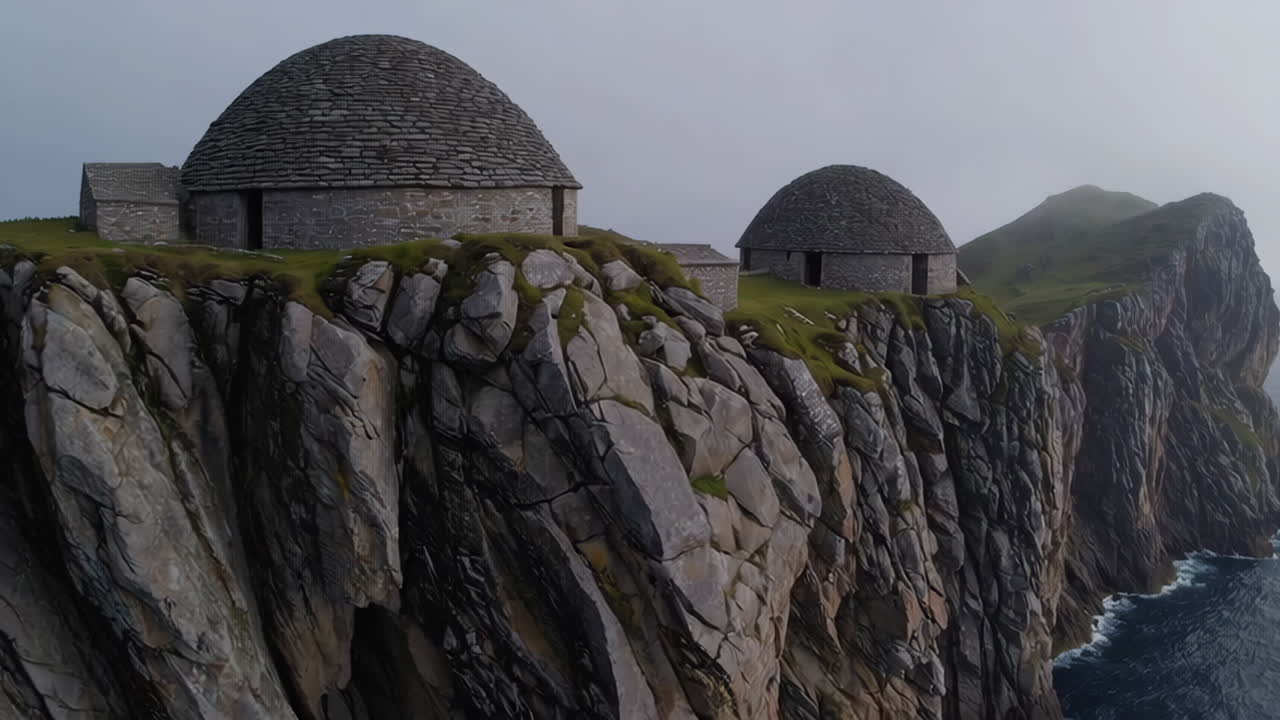 Ancient Stone Huts Perched on Dramatic Coastal Cliffs