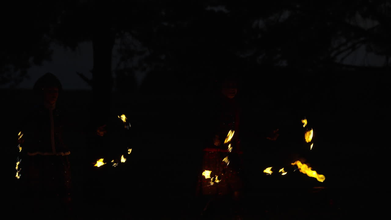 Fire Dancers at Night
