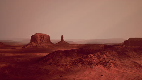 a desolate martian landscape with red rocks and a hazy sky