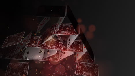 card pyramid collapsing on a dark background with lights animation