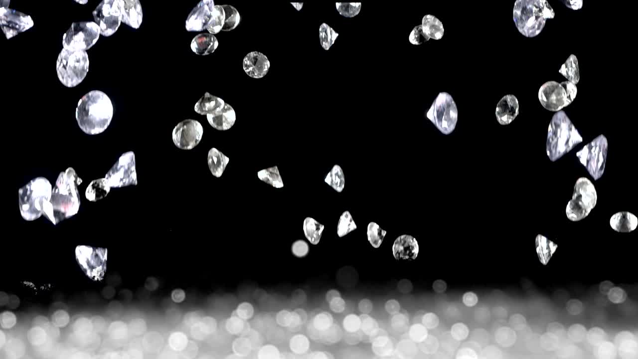 어두운 배경 위에 천천히 떨어지는 다이아몬드