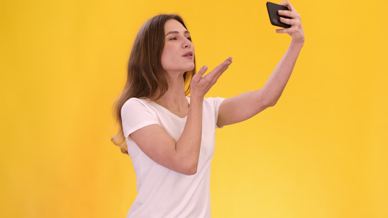 Woman taking selfies