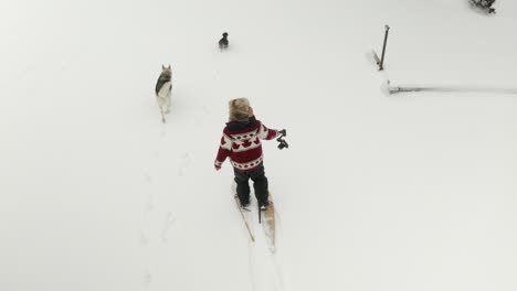 Canadian-man-filming-himself-walking-in-snow-shoes-with-a-DJI-Ronin-RSC-2-for-stock-footage-purposes