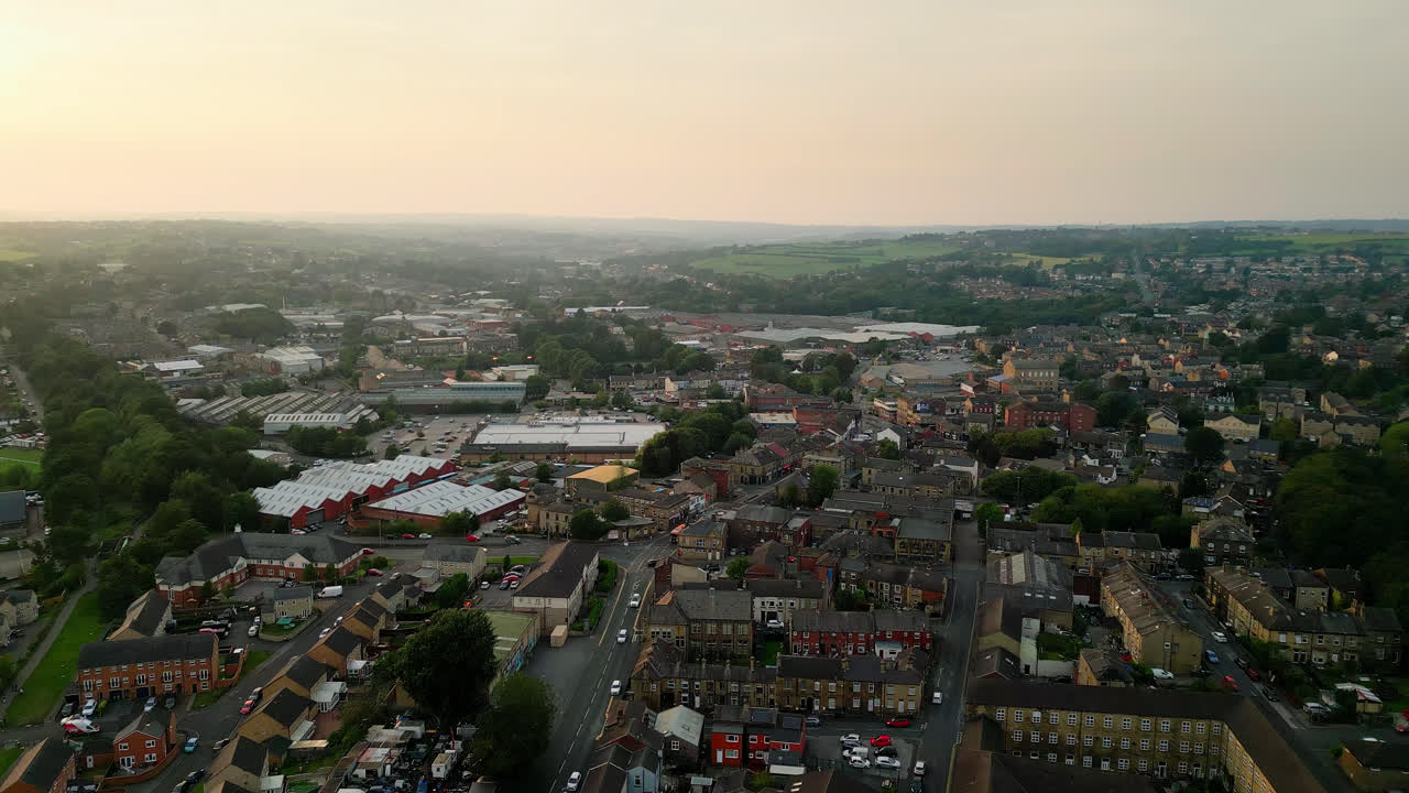 Explore Heckmondwike, UK, via drone footage: industry, streets, old town, and Yorkshire's summer evening ambiance