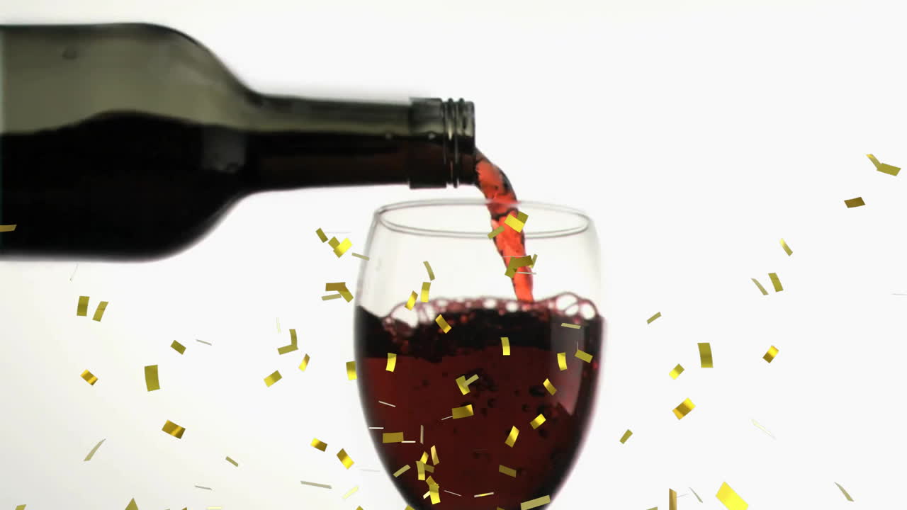 Animation de confettis sur un verre de vin rouge sur fond blanc