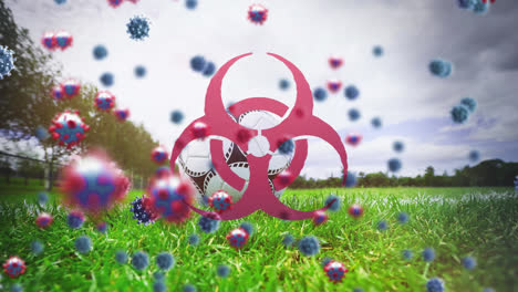 animation of covid 19 cells flying over biohazard sign and landscape background