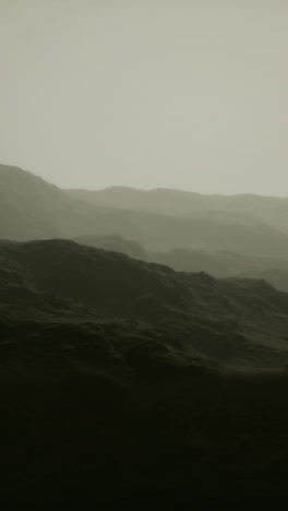 dramatic foggy mountain range landscape