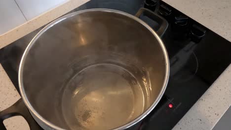 sequence showing water boiling on a stovetop