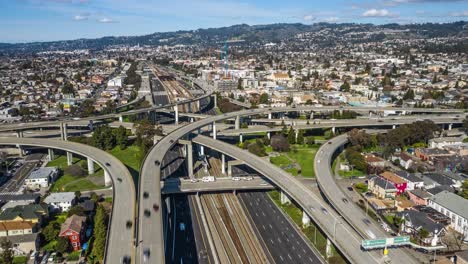 aerial hyperlapse of bay area junction in oakland going to san francisco i-80 freeway