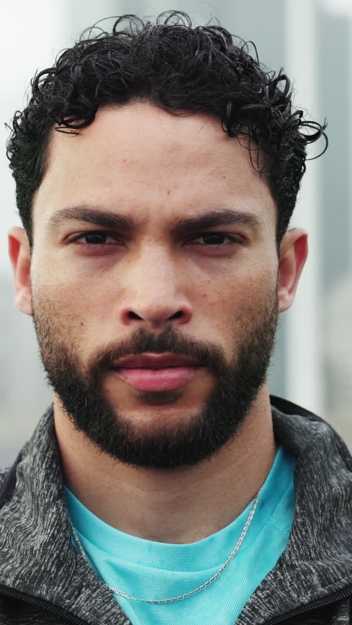 Young Man Winks and Blinks at Camera