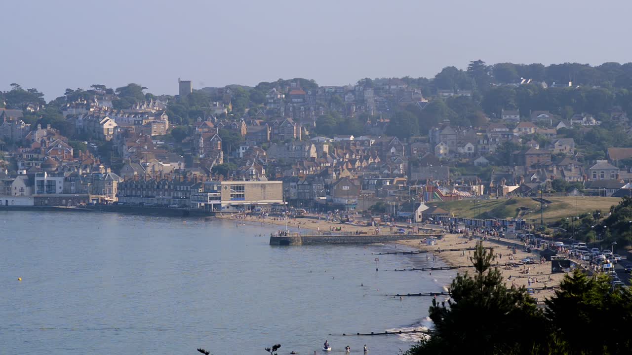 Landscape View At Swanage Beach With Unique Buildings On The Background In Dorset, England, UK. - wide shot