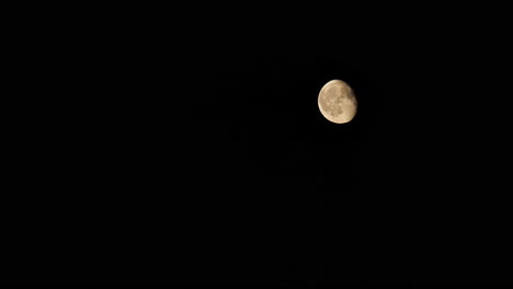 full moon in dark sky at night