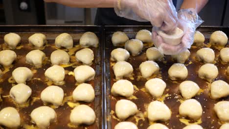 Top-view-of-baker-baking-cake-,