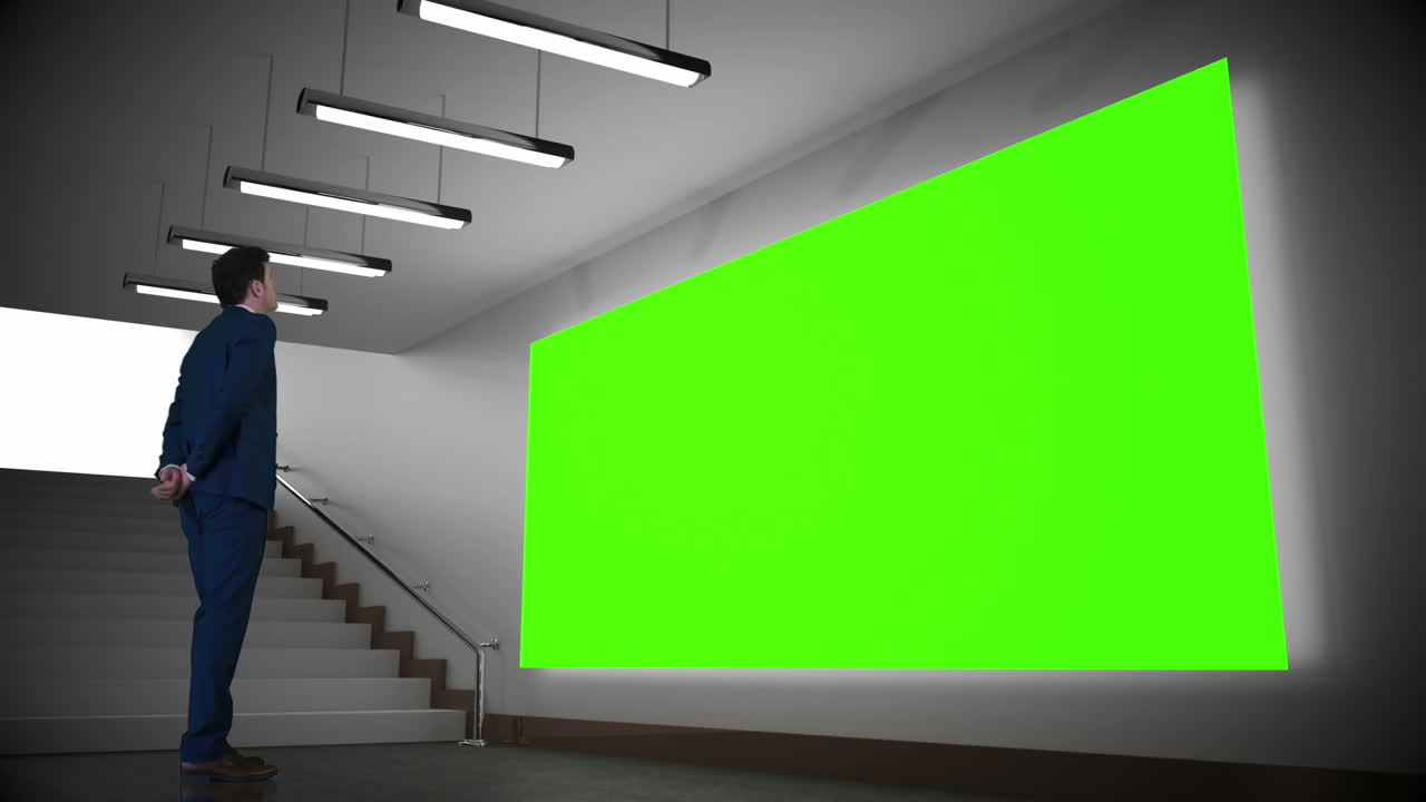 녹색 화면을 보는 사업가