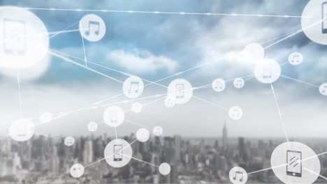 animation of network of digital icons against aerial view of cityscape