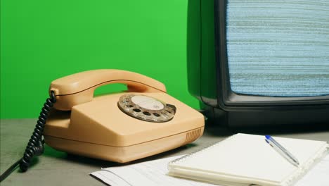 retro vintage phone, a yellow rotary telephone is displayed on a wooden desk, adding a nostalgic touch