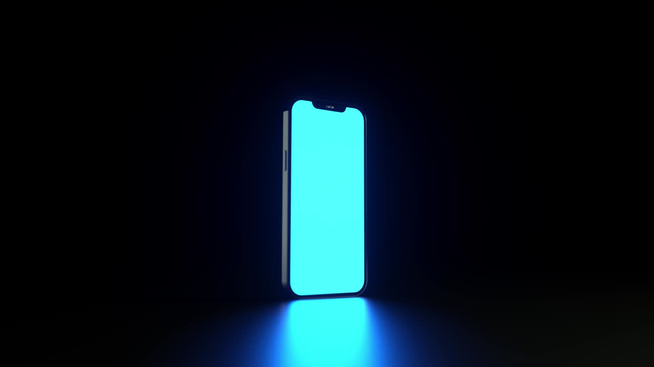 uno schermo a un solo colore si illumina su un telefono in piedi su una superficie scura.