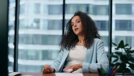 businesswoman discussing work questions at online chat sitting office close up.