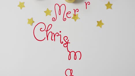 animation of stars falling over merry christmas text on white background