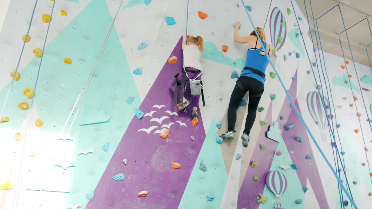 Mother and Daughter Rock Climbing