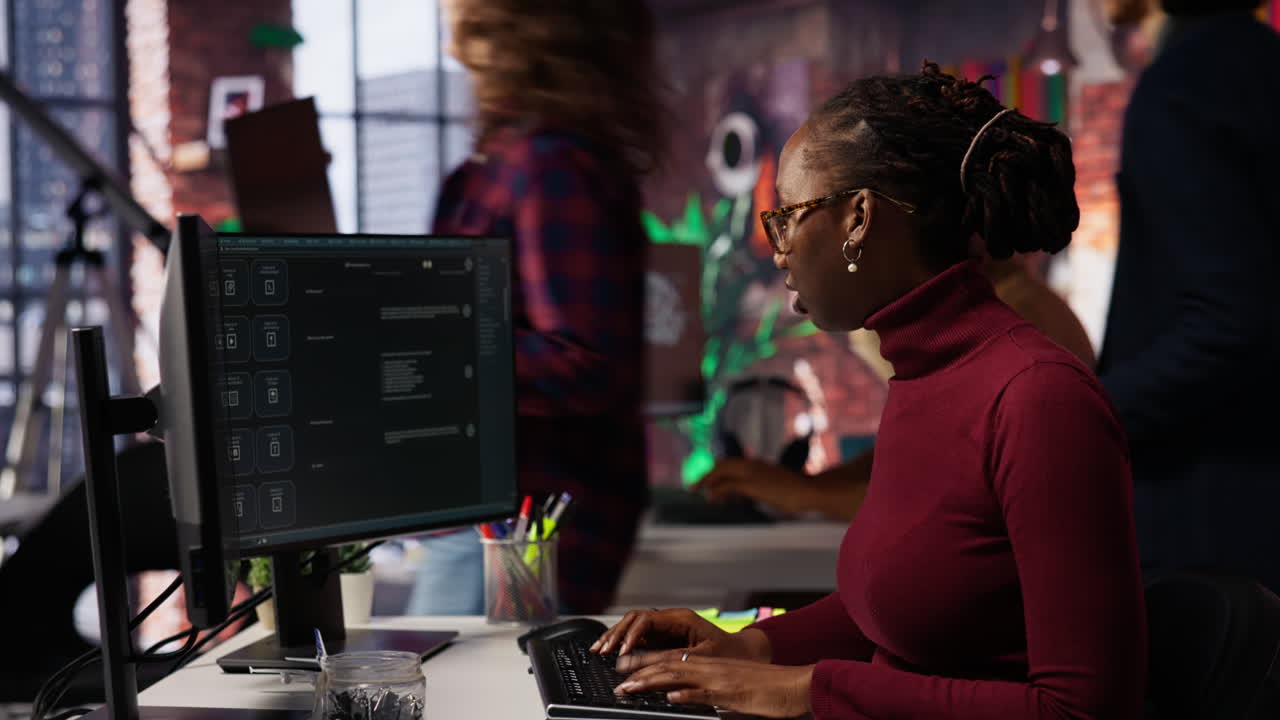 Startup worker using AI LLM chatbot to get help with coding tasks