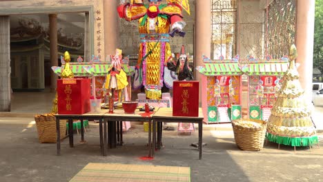 colorful chinese dolls in a temple setting