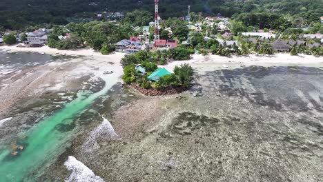 beach scene at la digue island in victoria seychelles