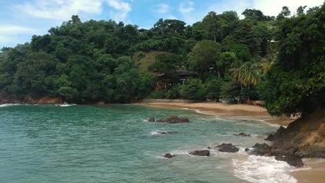 Low-flying-drone-shot-of-Bloody-Bay-on-the-island-of-Tobago