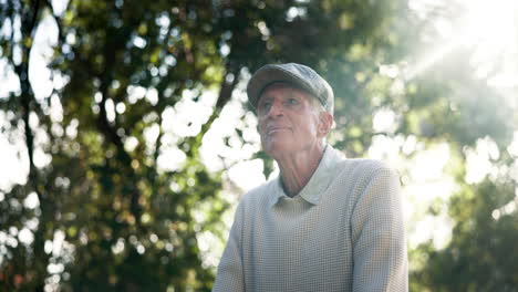 elderly man outdoors enjoying the sunlight