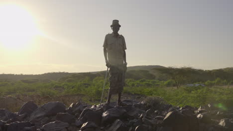 person standing in field in kenya, africa